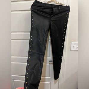 Black wax jeans with studs